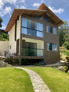 Casa de Campo em Lumiar com corrego ,lareira e churrasqueira